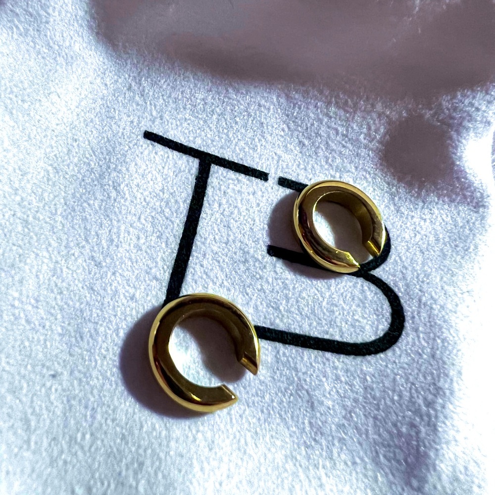 Never worn mini gold plated ear cuffs.